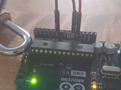 The Arduino connects to 5Volts, Ground and Analog 0